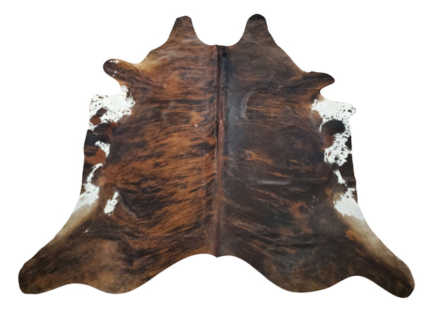 An extra-large cowhide rug with very interesting coloring, very soft and dark brown with slight white and great quality and free shipping.
