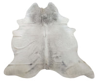 A large grey cowhide rug is a great way to add a touch of farmhouse or cottage style to your home decor. 