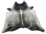 A stylish cowhide rug to match your perfect sofa and coffee table with neutral pattern, top seller grey white shade in cowhide USA, easy to maintain.