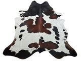 Tricolor cowhide area rug for modern boho living room, free shipping, soft, smooth and natural. These cow hide rugs are great for upholstery, draperies.