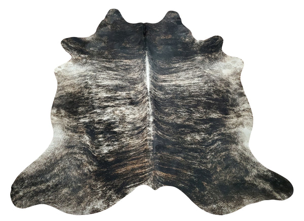 Stunning brindle cowhide rug in xl size with grey stripes will be a sprinkle of a masculine touch to mancave study or home office.