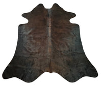 This small cowhide rug will brighten any property, the colors are vivid and it is soothing to  bare toes.