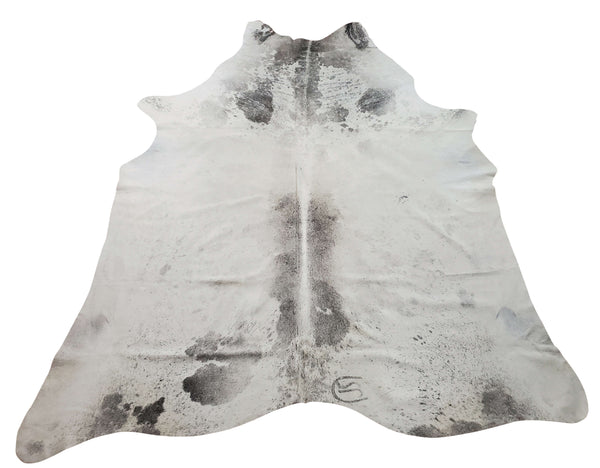 A cowhide rug in exotic gray white pattern amazing for any interior and also upholstery, put this xxl cowhide rug under your coffee table