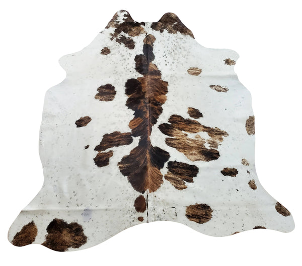 A spotted cowhide rug is a perfect way to add some country charm to your home. This tricolor, 6ft spotted rug is the perfect size for small spaces like a fireplace.