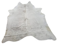 Light grey brindle cowhide rug is perfect for any decor, this rug is sure to add a touch of sophistication to any space. It is hundred percent natural and real. 