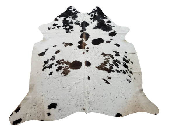 This tricolor cowhide rug is bursting with beautiful brown and white perfect for ceilings to floor decor, these are natural, real and aesthetic.