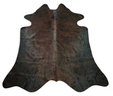 This mini cowhide rug will enhance the personality of any apartment, the colors are vibrant, and the plush thickness is soothing to my bare feet.