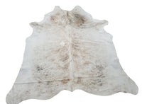 What a stunning cowhide rug in natural brindle pattern, super soft rug and totally reasonable price, great for any living room or bedroom.