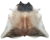 Our latest grey tan cowhide rug with unique patterns, a perfect choice for our interior and home staging projects, we select these cowhides for one of its kind texture.