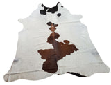 One of the best sellers brown white cowhide rug in an exotic and unique pattern perfect for wooden floor, upholstery, or even draped over furniture.