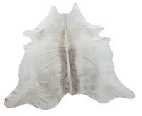 If you need a cowhide rug in a gray tone, this one is perfect. It is plush, comfortable on foot, and very soft to the touch and a great way to add neutral to an apartment. 