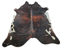 Looking for a dark cowhide rug to add some rustic flair to your home? Check out our selection of natural black and brown rugs and free shipping all over the USA