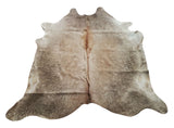 This champagne cowhide rug with an extra dose of the darker pattern will bring a stylish look to any space, very soft, smooth and perfect texture.