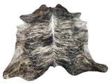 If you're looking for a brindle cowhide rug that makes a statement, this is the perfect choice. With its unique pattern and muted colors, it's sure to become the focal point of any room.