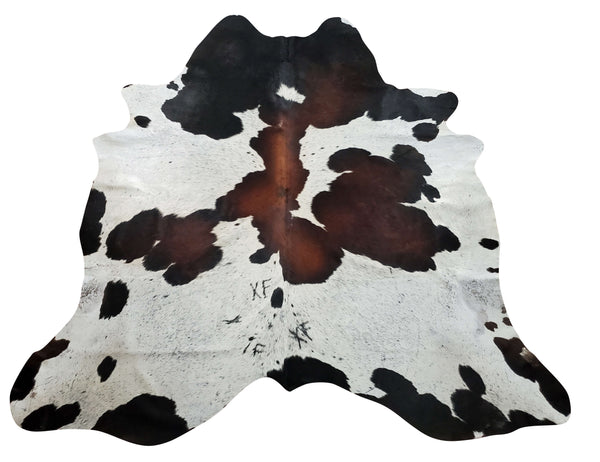 Check out our tricolor cowhide rug, It's dark brown and white colors will make a statement in any room, these are handpicked for unique and exotic pattern.