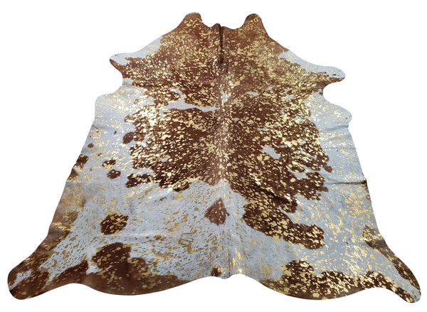 Cowhide rug gold is trending on pure white perfect for living room and nursery cowhide rug with gold is also in rose metallic beautiful in the bedroom.