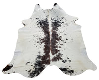 This black white cowhide rug is real and versatile, perfect to brighten up a space, make room feel bigger or wall that needs some character.