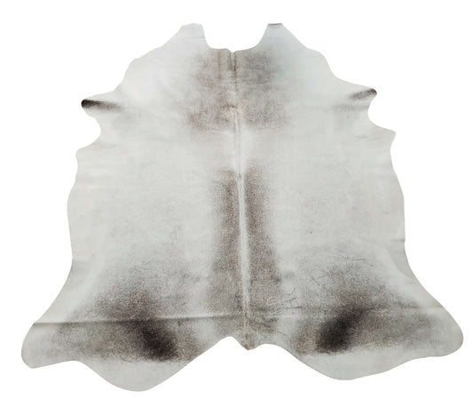 This grey cowhide rug with some ivory is beautiful, the natural shade is impeccable. It is so plushy and soft, perfect for any space of your house. 