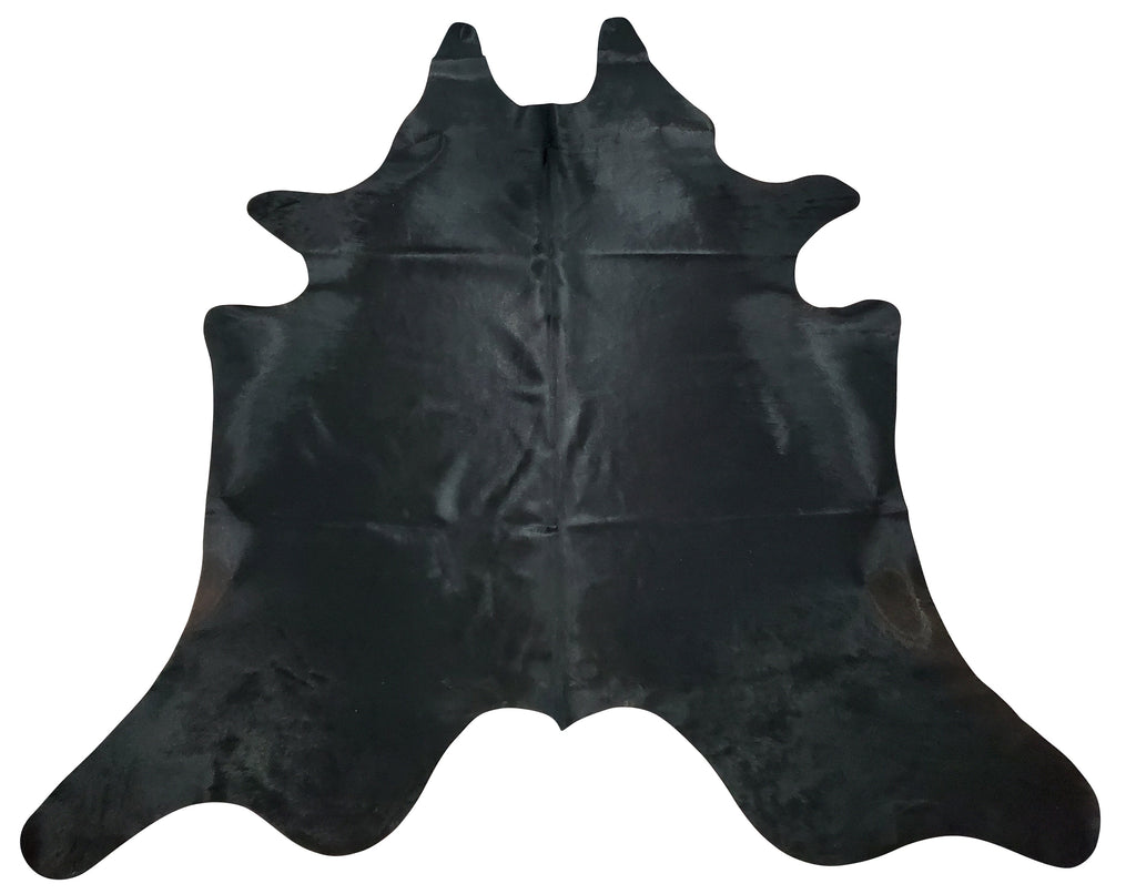 Add a touch of luxury to your space with a premium cowhide rug, featuring a deep black shade and natural texture, perfect for any decor style.