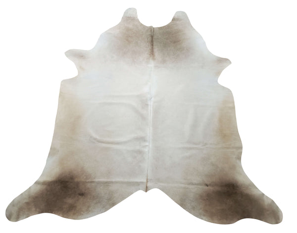 Browsing for a cowhide rug that makes your guest stop and stares at your decor, add beige and white to your home and it will blend to give a country look.