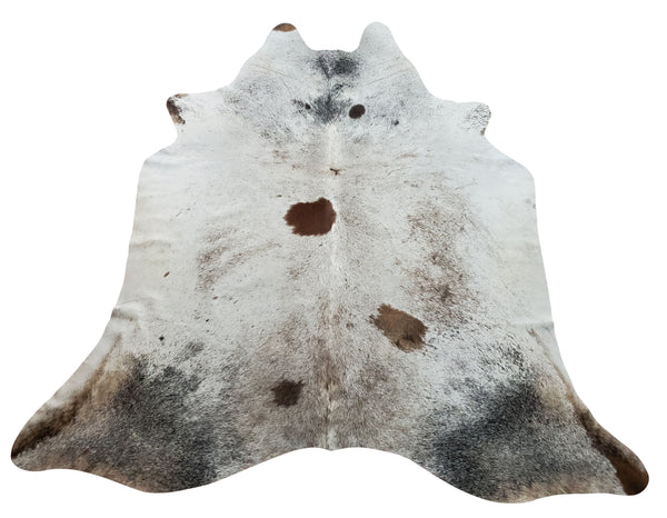 This beautiful natural cowhide rug in a gorgeous spotted pattern can have even more impact than a simple, more expensive rug and is great for all rooms.