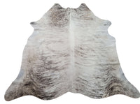 This brindle cowhide rug is large, unique, exotic, soft and smooth - perfect for any interior! it is extremely durable and will last for years.