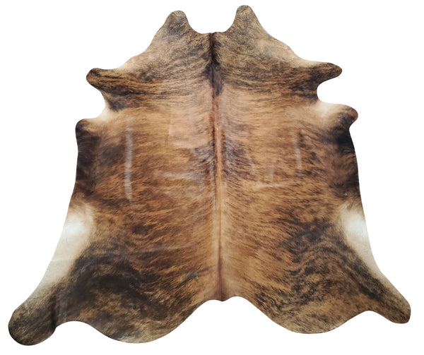 Brindle cowhide rugs can be a game-changer on how a room looks and feel, it's soft, natural and authentic. Also great for upholstery and modern farmhouse. 
