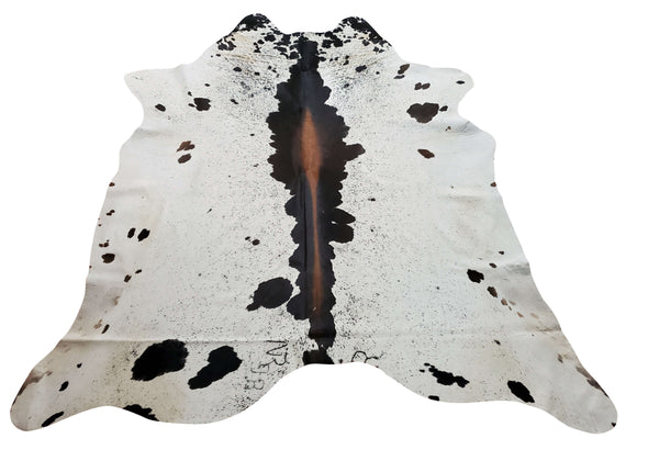 Brazilian cowhide rug speckled very soft and smooth with back finished to suede for western and southern style. This cowhide rug for sale near me in grey white is gorgeous southern cowhide for living room or bedroom also great for layering authentic and natural