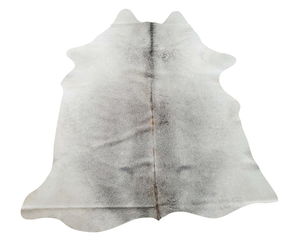 A lovely grey cowhide rug used anyplace in your home with your recliner, home bar, or modern living space and free shipping all over the U.S.