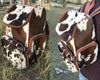 Dark brown cowhide backpack speckled hair on hide
