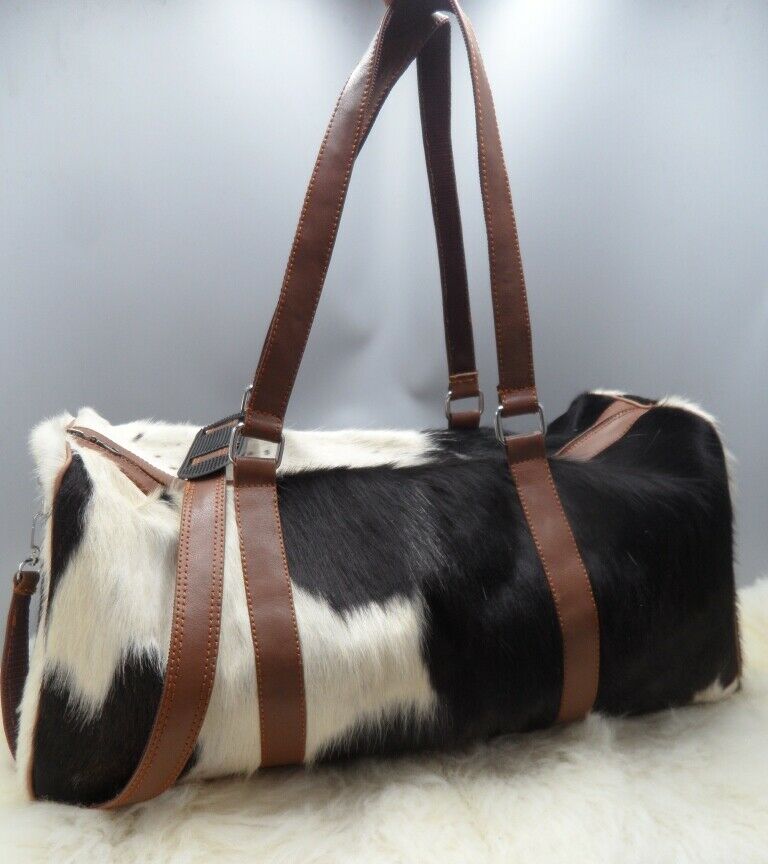 Custom made cowhide duffel bags.