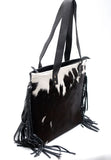 This stylish cowhide bag comes in a variety of colors and styles to suit any taste. 