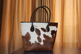 vintage cowhide purse brown and white