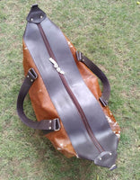 Cow fur duffel bag for travel and can be kept on over head luggae bag made real hair on hide perfect messenger bag.