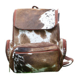 A brown white cowhide backpack is the perfect way to show your unique style. Made from real cowhide, this backpack is available in many different shades, making it perfect for school or university. 