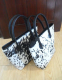 The best part about this cowhide bag is that it is versatile and can be worn with just about anything.