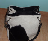 This real cowhide shoulder bag is incredible, very impressed by the detail, the quality and craftsmanship