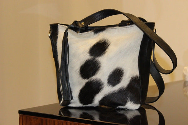 Natural Cowhide Messenger Bag in black and white