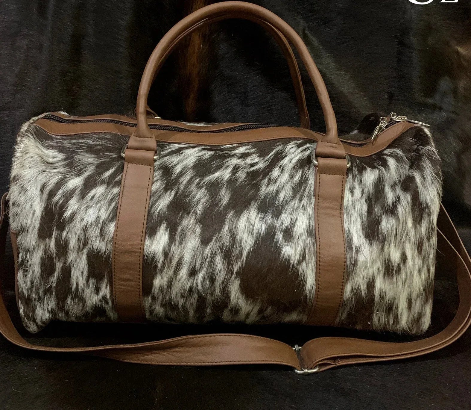 spotted cowhide duffle bag travel leather