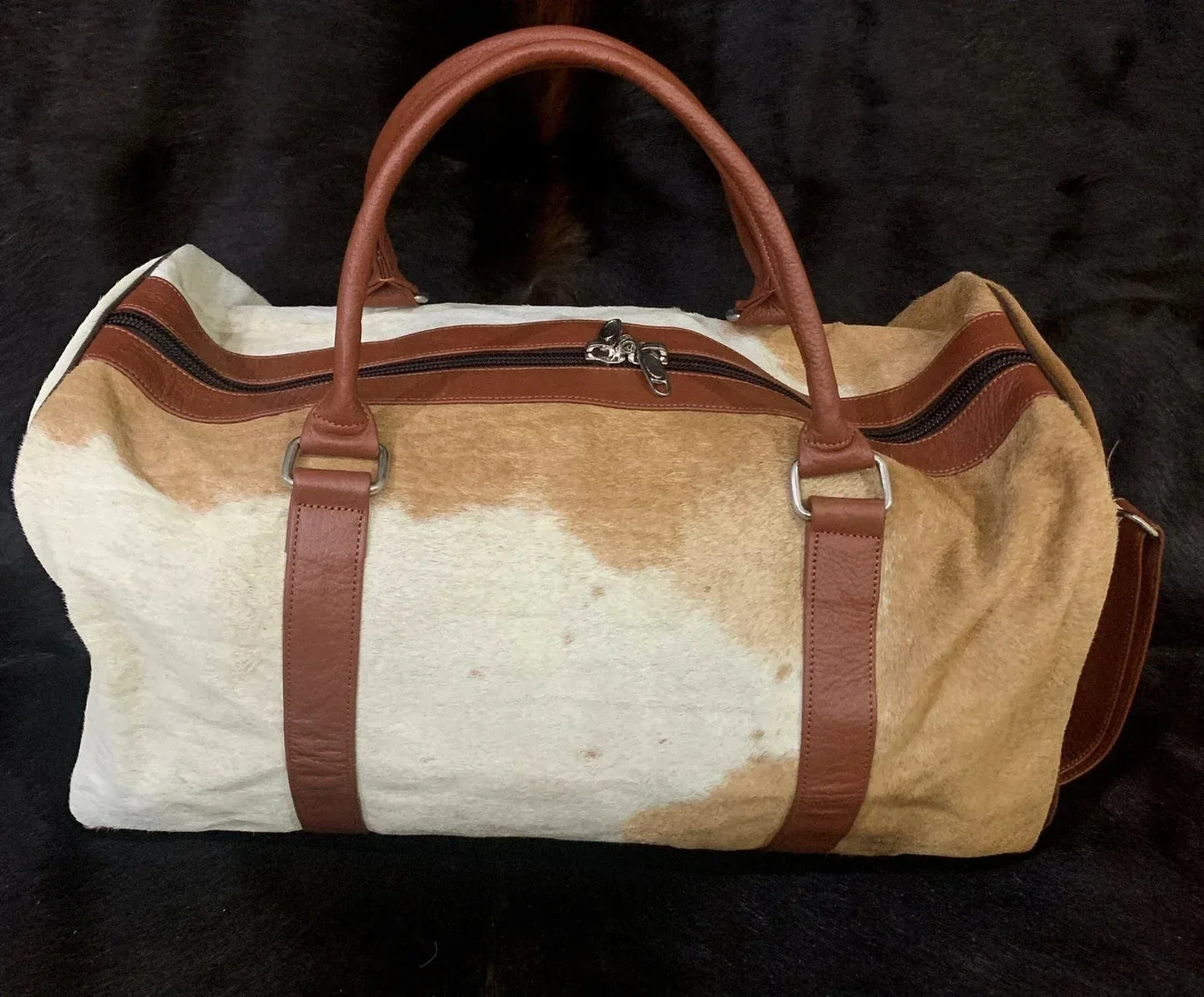 spotted cowhide duffle bag travel leather